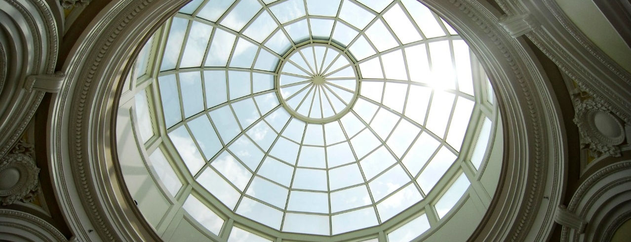 The underside of the Van Wormer Hall dome, showing off decorative architecture.